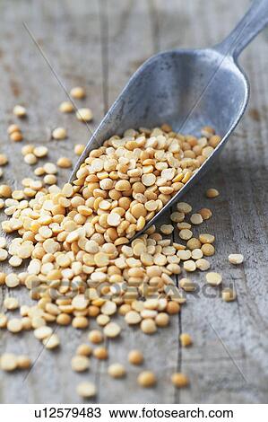 Stock Image - Yellow split lentils. Fotosearch