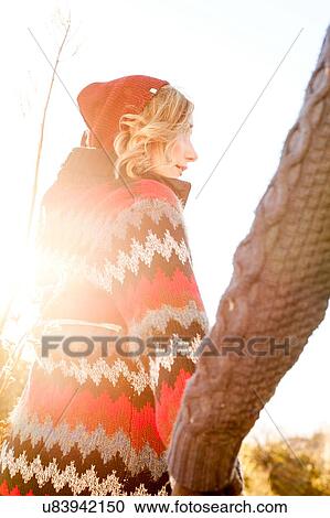 "Young couple holding hands, rear view" View Large Photo Image Stock Image - "Young couple holding hands, rear view". Fotosearch