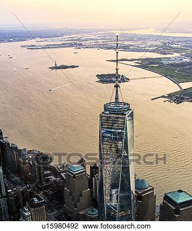 Stock Image - Aerial view of One World Trade Centre at dusk. Fotosearch