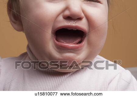 Baby girl crying View Large Photo Image Stock Photo - Baby girl crying. Fotosearch