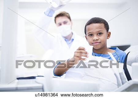 Boy drinking water View Large Photo Image Picture - Boy drinking water. Fotosearch