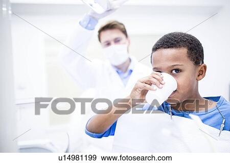 Stock Photo - Boy drinking water. Fotosearch