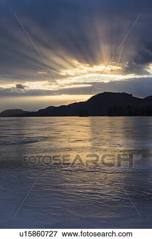 Stock Photo - Brant Lake in Adirondack region at dusk. Fotosearch