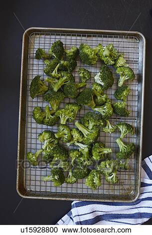 Stock Image - Broccoli on tray. Fotosearch