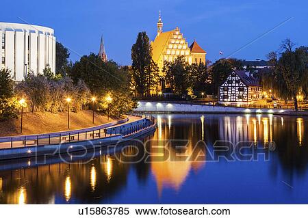 Bydgoszcz Cathedral reflected in Brda River Bydgoszcz, Kuyavian-Pomeranian, Poland View Large Photo Image Stock Photography - Bydgoszcz Cathedral reflected in Brda River Bydgoszcz, Kuyavian-Pomeranian, Poland. Fotosearch