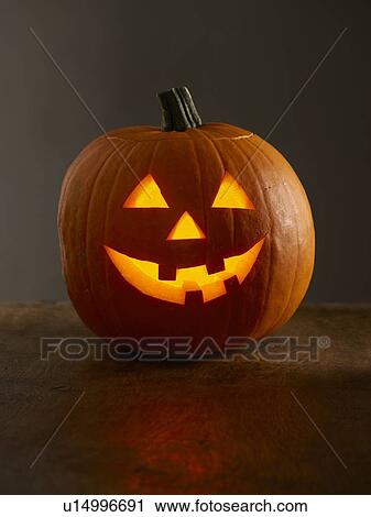 Stock Image - Carved pumpkin. Fotosearch