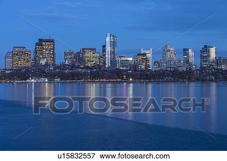 Charles river and illuminated downtown district at dusk View Large Photo Image Stock Photo - Charles river and illuminated downtown district at dusk. Fotosearch