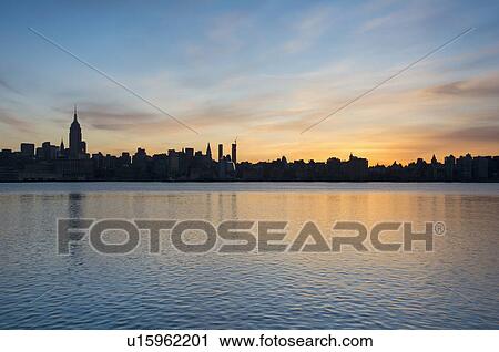 City skyline at dawn View Large Photo Image Stock Image - City skyline at dawn. Fotosearch