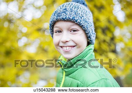Close-up of boy smiling View Large Photo Image Stock Photo - Close-up of boy smiling. Fotosearch