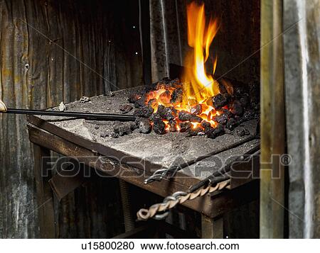 Close up of coal burning in furnace View Large Photo Image Stock Image - Close up of coal burning in furnace. Fotosearch
