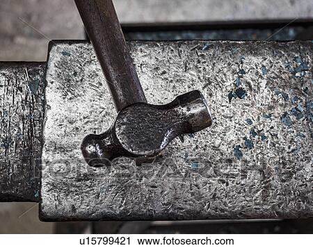 Stock Image - Close up of iron hammer. Fotosearch