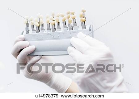Stock Photo - Close-Up of teeth whitening. Fotosearch