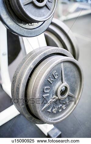 Close-up of weight plates View Large Photo Image Stock Photography - Close-up of weight plates. Fotosearch