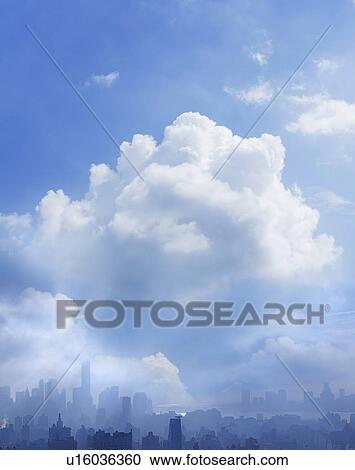Cloudy sky over cityscape View Large Photo Image Stock Image - Cloudy sky over cityscape. Fotosearch