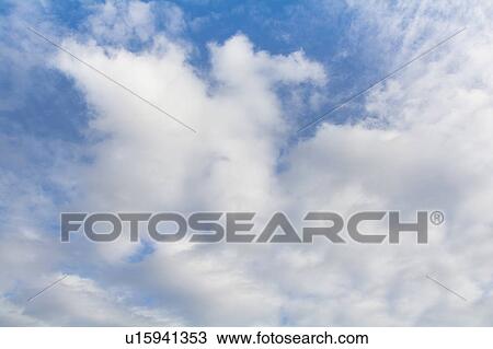 Cumulus clouds in sky View Large Photo Image Stock Image - Cumulus clouds in sky. Fotosearch