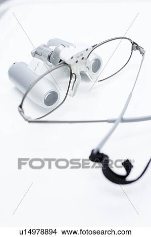 Picture - Dental magnifying glass. Fotosearch