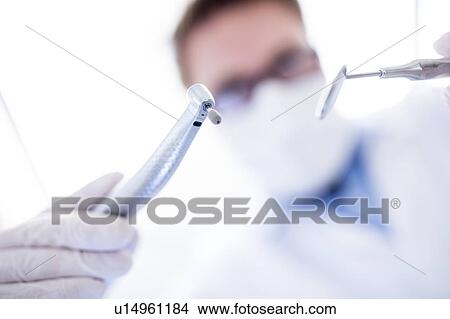 Dentist with dental equipment View Large Photo Image Picture - Dentist with dental equipment. Fotosearch