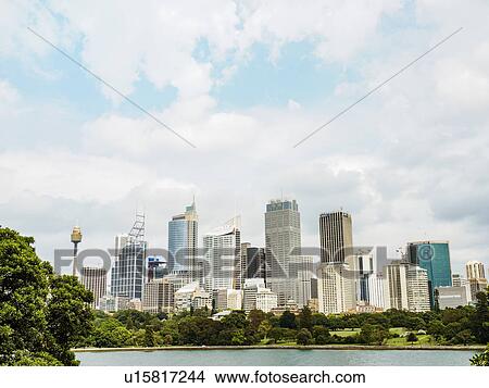 Picture - Downtown district on cloudy day. Fotosearch