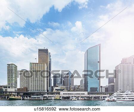 Stock Image - Downtown district on cloudy day. Fotosearch