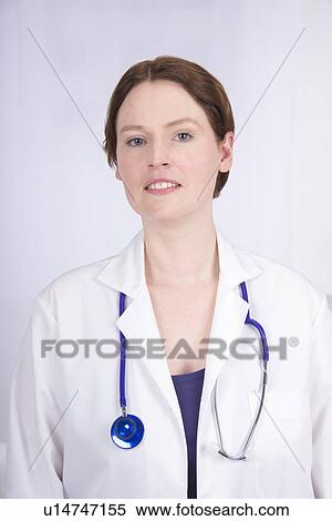Stock Photography - Female doctor, studio shot. Fotosearch