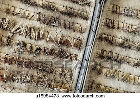 Stock Image - Fishing tackles in box. Fotosearch