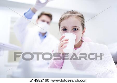 Stock Image - Girl drinking water. Fotosearch