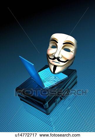 Stock Photo - Internet activist mask and laptop. Fotosearch