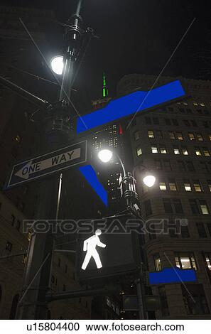 Low-angle view of directional signs in city View Large Photo Image Stock Image - Low-angle view of directional signs in city. Fotosearch