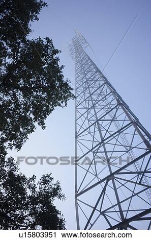 Low-angle view of electricity pylon View Large Photo Image Stock Image - Low-angle view of electricity pylon. Fotosearch