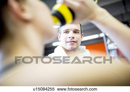 Stock Photography - Man looking at woman. Fotosearch