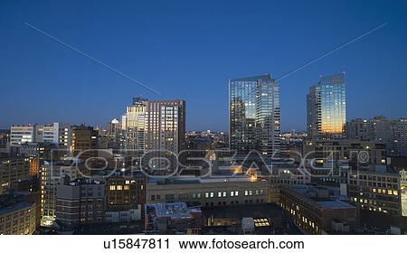 Stock Image - Modern downtown district at dawn. Fotosearch