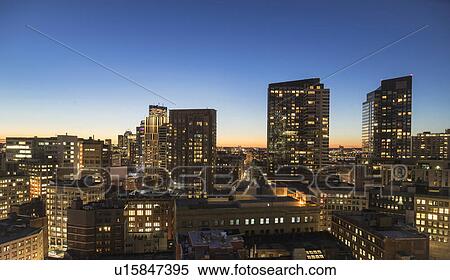 Stock Photography - Modern downtown district at dusk. Fotosearch