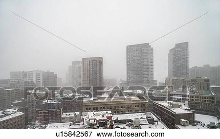 Modern downtown district covered with snow View Large Photo Image Stock Photo - Modern downtown district covered with snow. Fotosearch