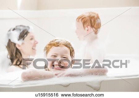 Mother and children (2-3, 4-5) having bubble bath View Large Photo Image Stock Photograph - Mother and children (2-3, 4-5) having bubble bath. Fotosearch