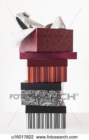 Stock Image - Multi colored shoe boxes. Fotosearch