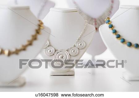 Necklaces on display View Large Photo Image Stock Photo - Necklaces on display. Fotosearch