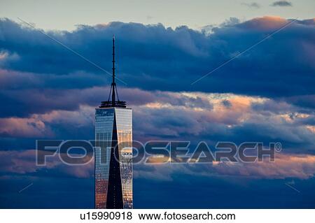 One World Trade Center against dramatic sky at dusk View Large Photo Image Stock Photo - One World Trade Center against dramatic sky at dusk. Fotosearch