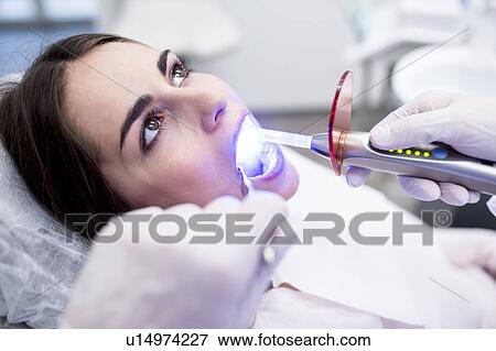 Stock Photo - Patient getting ultraviolet light. Fotosearch