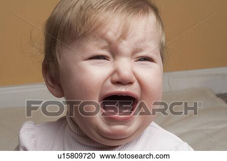 Portrait of baby girl crying View Large Photo Image Stock Image - Portrait of baby girl crying. Fotosearch