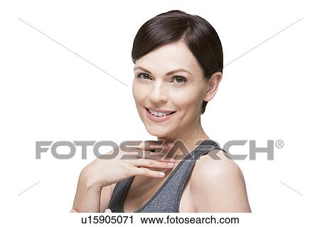 Stock Image - Portrait of smiling woman. Fotosearch