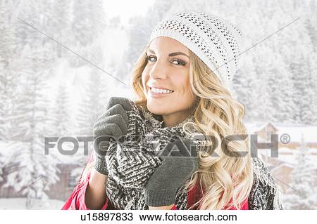Portrait of young woman in winter wear View Large Photo Image Stock Image - Portrait of young woman in winter wear. Fotosearch