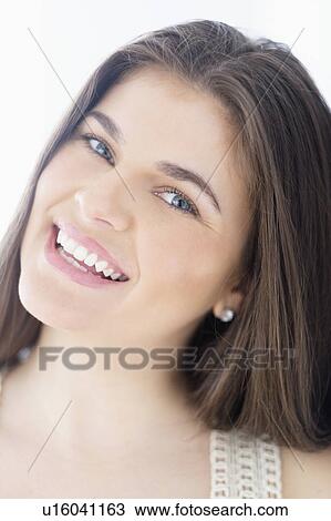 Portrait of young woman with brown hair View Large Photo Image Stock Image - Portrait of young woman with brown hair. Fotosearch