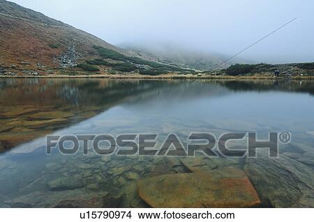Rocks in clear water View Large Photo Image Picture - Rocks in clear water. Fotosearch