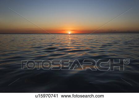 Romantic sunset over sea View Large Photo Image Stock Image - Romantic sunset over sea. Fotosearch