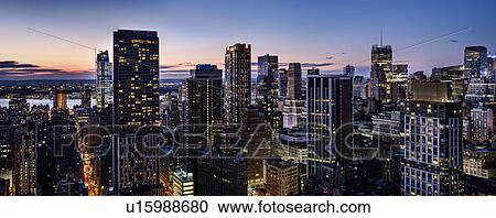 Skyline of New York at dusk View Large Photo Image Stock Image - Skyline of New York at dusk. Fotosearch