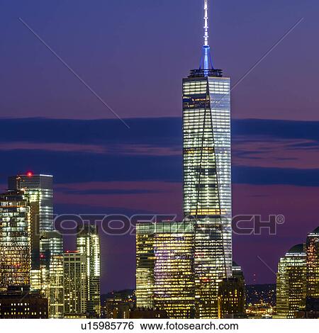 Stock Photograph - Skyline of New York at dusk with view of One World Trade Center. Fotosearch