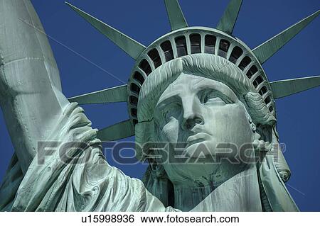 Statue of Liberty against clear sky View Large Photo Image Stock Photograph - Statue of Liberty against clear sky. Fotosearch
