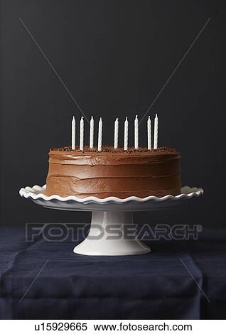 Studio shot of chocolate birthday cake View Large Photo Image Stock Photography - Studio shot of chocolate birthday cake. Fotosearch