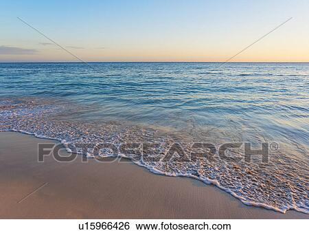Sunset over tropical sea View Large Photo Image Stock Photograph - Sunset over tropical sea. Fotosearch