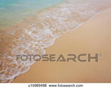 Surf on sandy beach View Large Photo Image Stock Photo - Surf on sandy beach. Fotosearch